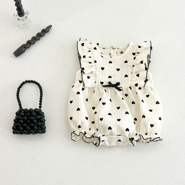 Heart printed ruffle romper